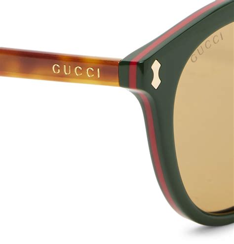 gucci men's turtle round keyhole sunglasses green and red